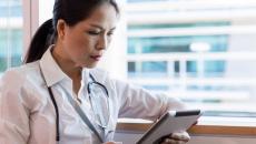 Healthcare provider on a tablet